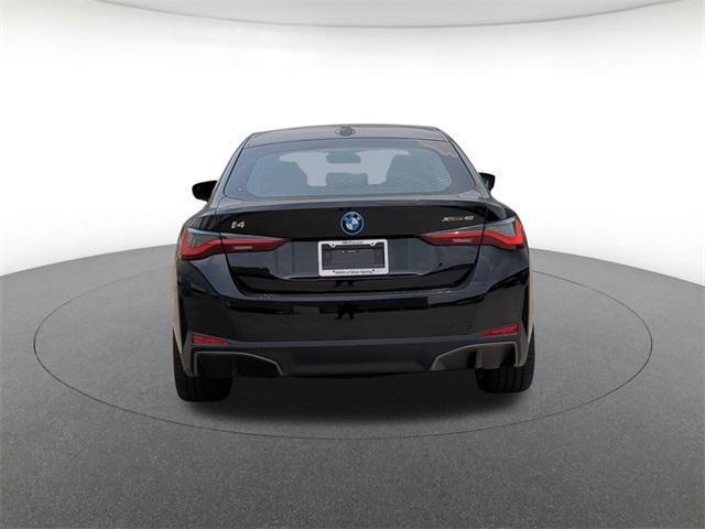 Photo of 2025 Black Sapphire Metallic BMW i4 Gran Coupe