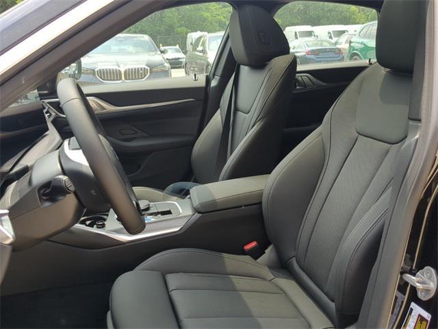 Photo of 2025 Black Sapphire Metallic BMW i4 Gran Coupe