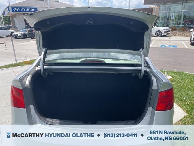 Photo of 2013 Bright Silver Metallic Kia Forte