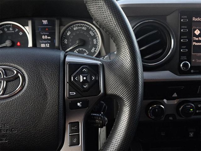 Photo of 2021 Midnight Black Metallic Toyota Tacoma