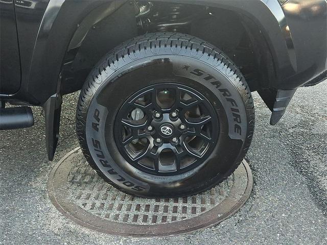 Photo of 2021 Midnight Black Metallic Toyota Tacoma