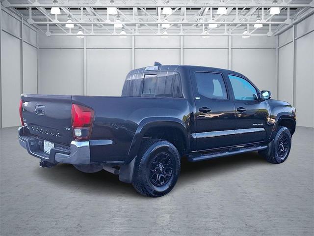 Photo of 2021 Midnight Black Metallic Toyota Tacoma