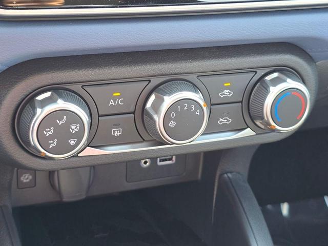 Photo of 2025 Aspen White Nissan Versa