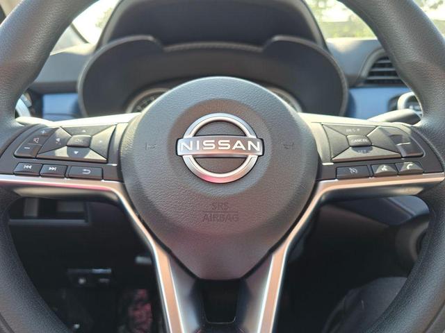 Photo of 2025 Aspen White Nissan Versa
