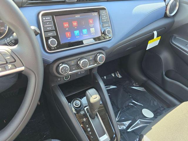 Photo of 2025 Aspen White Nissan Versa