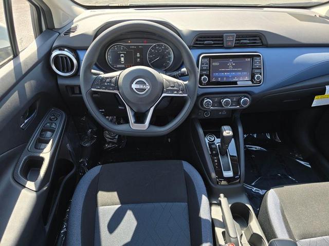 Photo of 2025 Aspen White Nissan Versa