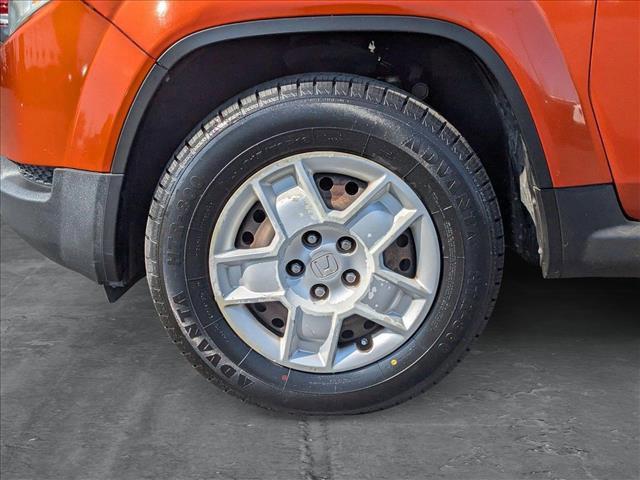 Photo of 2009 Citrus Fire Metallic Honda Element