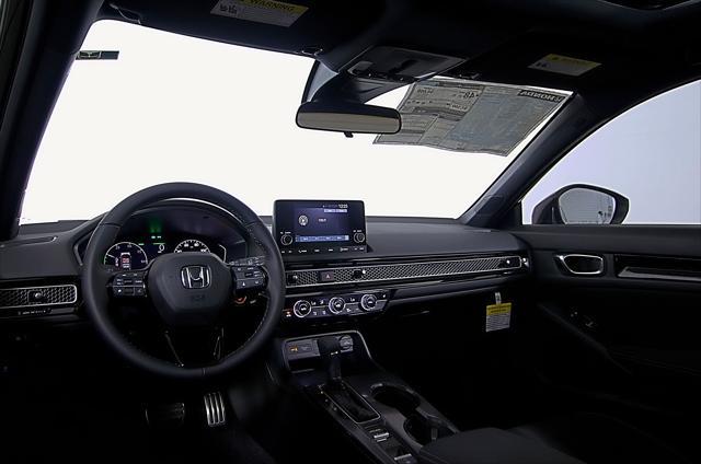 Photo of 2025 Crystal Black Pearl Honda Civic Hybrid