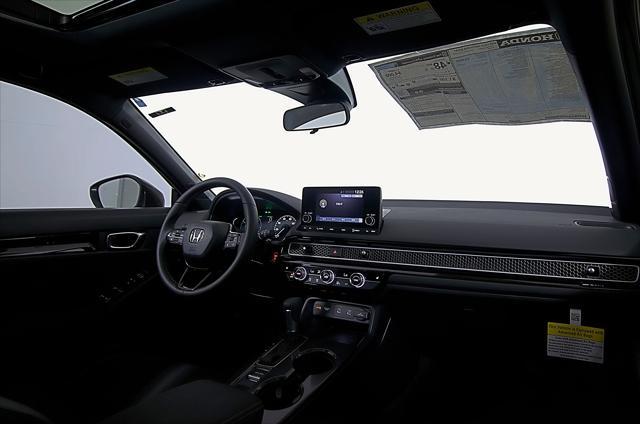Photo of 2025 Crystal Black Pearl Honda Civic Hybrid