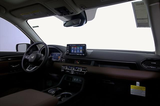 Photo of 2025 White Pearl Honda Pilot