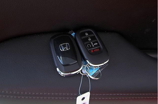 Photo of 2025 Rallye Red Honda Civic Hybrid