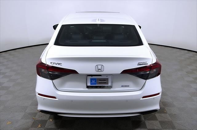Photo of 2025 White Pearl Honda Civic Hybrid