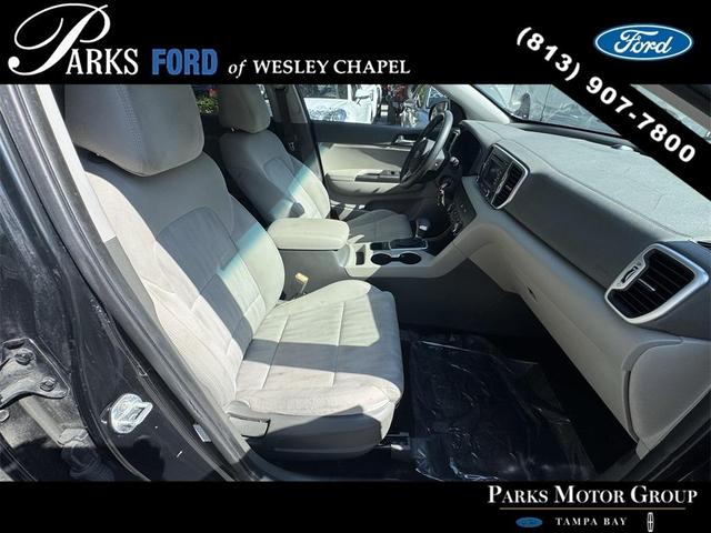 Photo of 2017 Black Cherry Kia Sportage