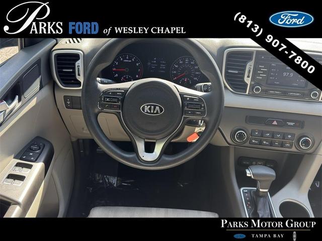 Photo of 2017 Black Cherry Kia Sportage
