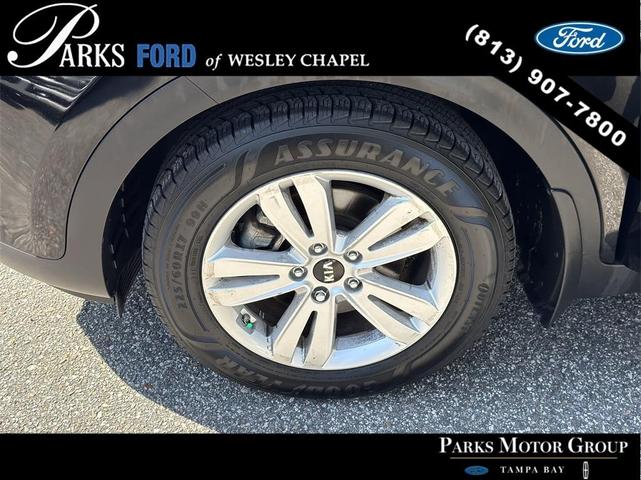 Photo of 2017 Black Cherry Kia Sportage