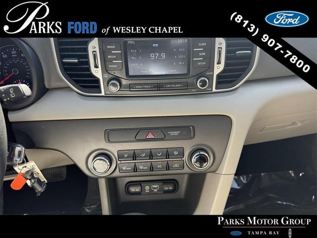 Photo of 2017 Black Cherry Kia Sportage