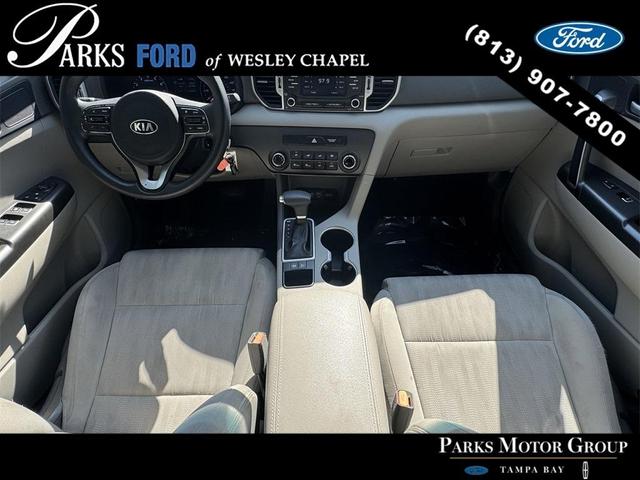 Photo of 2017 Black Cherry Kia Sportage