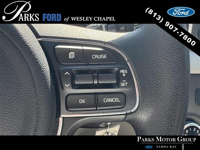 Photo of 2017 Black Cherry Kia Sportage