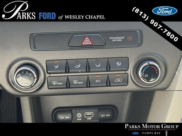 Photo of 2017 Black Cherry Kia Sportage
