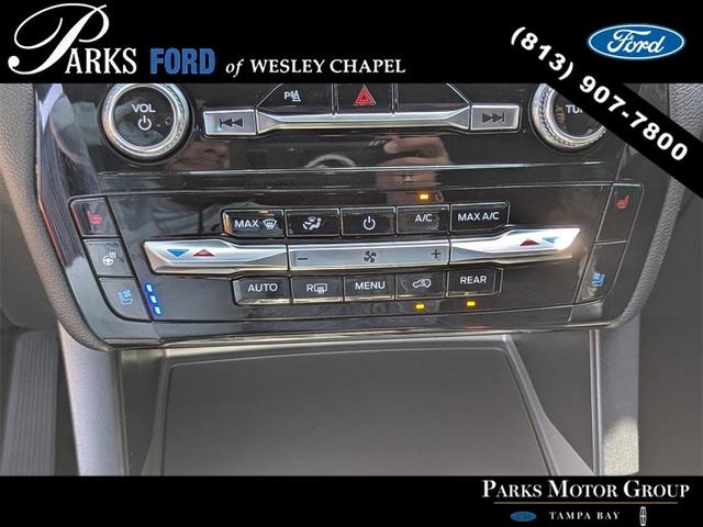 Photo of 2024 Forged Green Metallic Ford Explorer