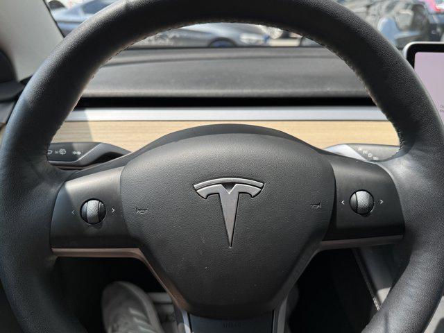 Photo of 2021 Pearl White Multi-Coat Tesla Model 3
