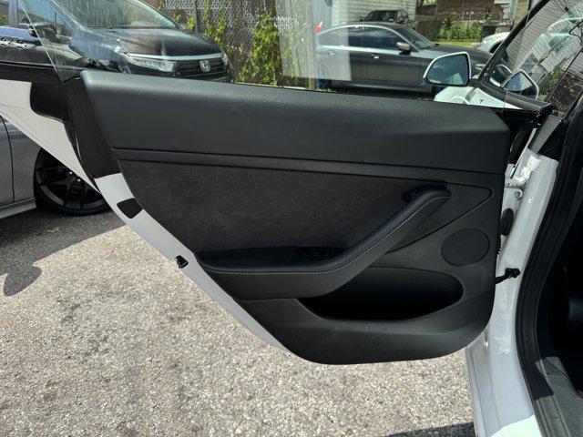 Photo of 2021 Pearl White Multi-Coat Tesla Model 3