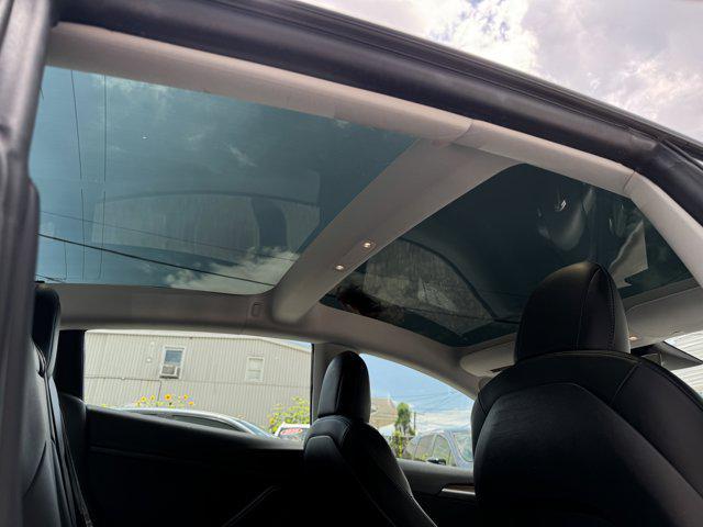 Photo of 2021 Pearl White Multi-Coat Tesla Model 3