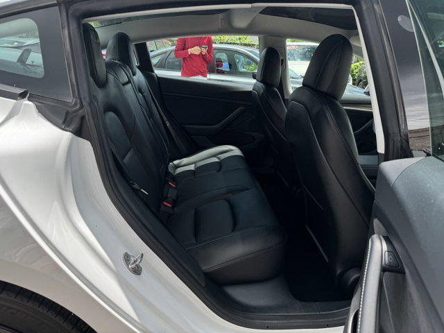 Photo of 2021 Pearl White Multi-Coat Tesla Model 3