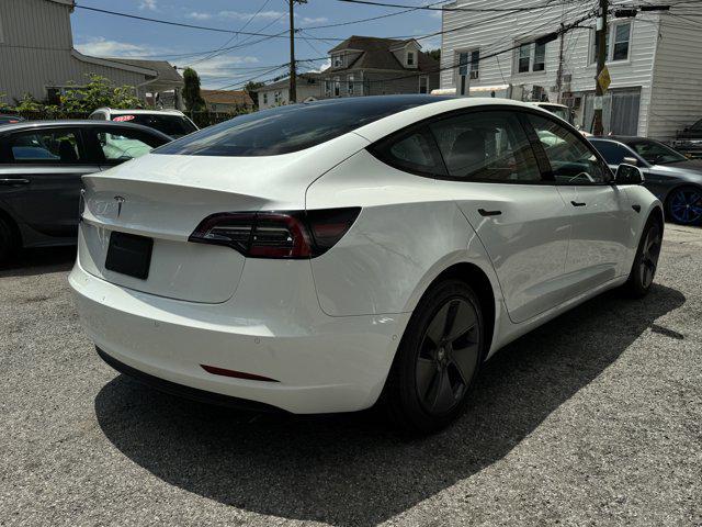 Photo of 2021 Pearl White Multi-Coat Tesla Model 3