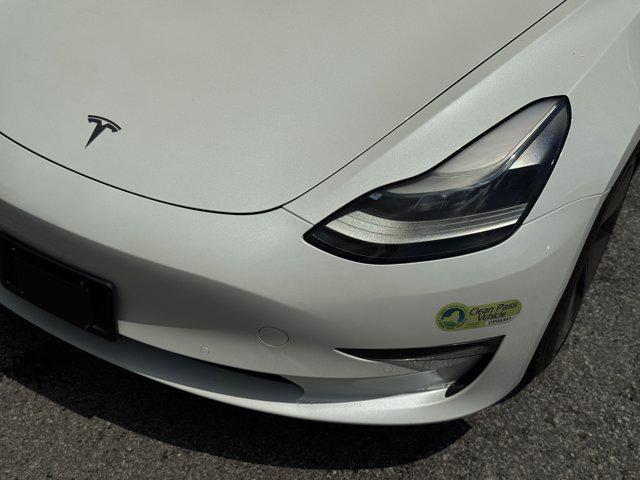 Photo of 2021 Pearl White Multi-Coat Tesla Model 3