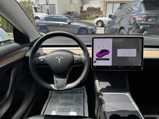 Photo of 2021 Pearl White Multi-Coat Tesla Model 3