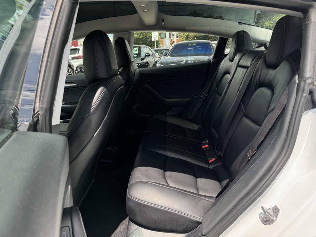 Photo of 2021 Pearl White Multi-Coat Tesla Model 3