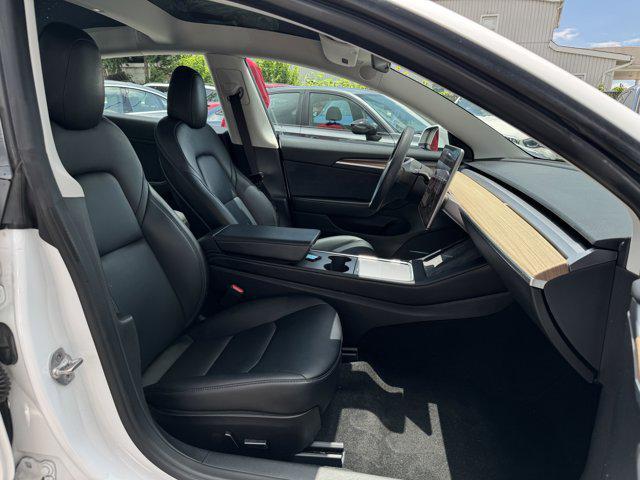 Photo of 2021 Pearl White Multi-Coat Tesla Model 3
