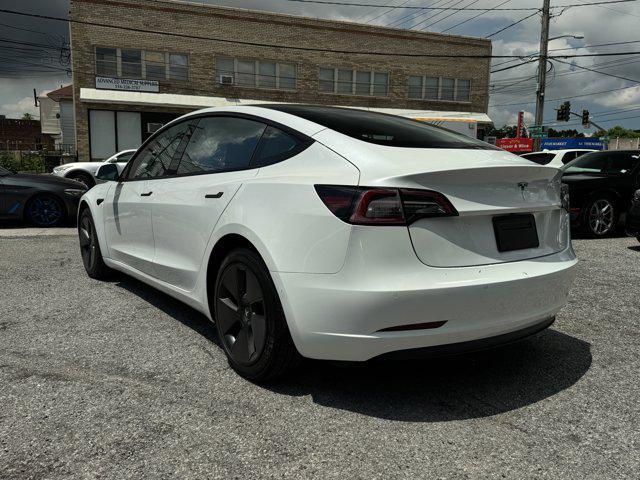 Photo of 2021 Pearl White Multi-Coat Tesla Model 3