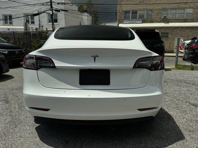 Photo of 2021 Pearl White Multi-Coat Tesla Model 3