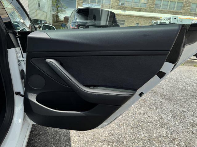 Photo of 2021 Pearl White Multi-Coat Tesla Model 3