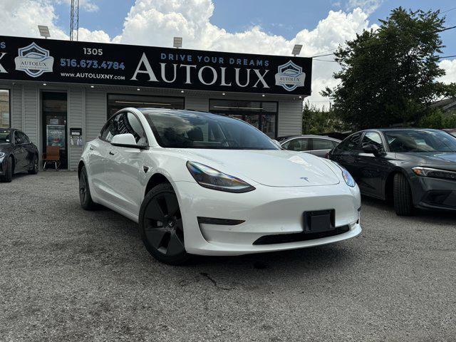 Photo of 2021 Pearl White Multi-Coat Tesla Model 3