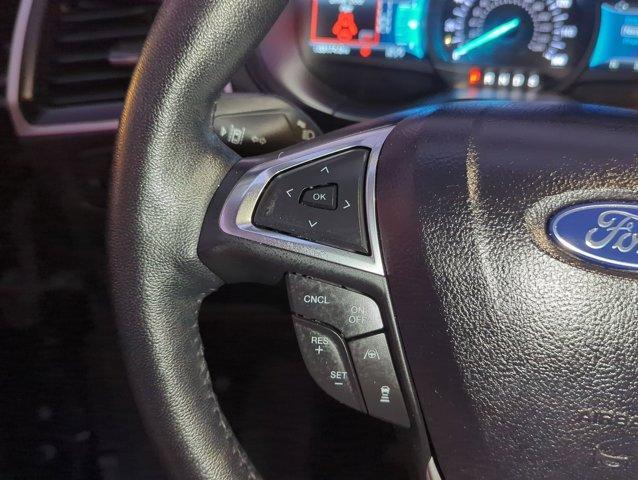 Photo of 2024 Agate Black Metallic Ford Edge