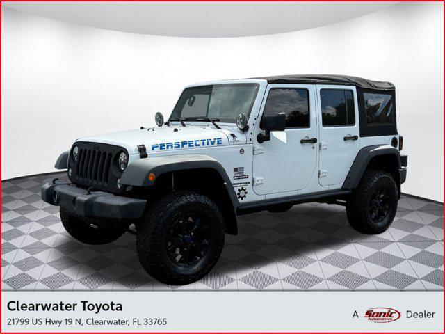 Photo of 2014 Bright White Clearcoat Jeep Wrangler Unlimited