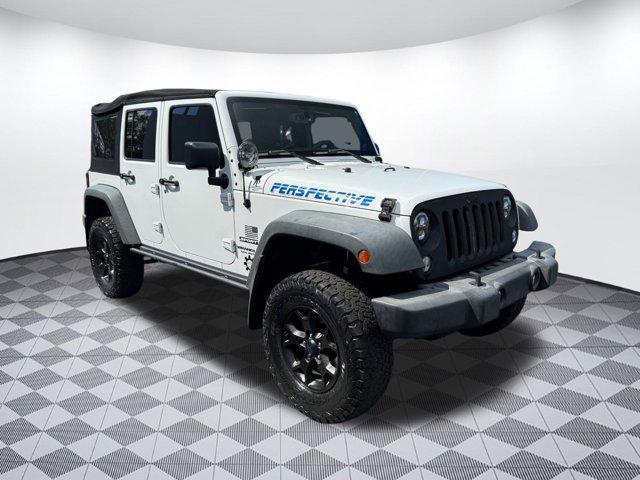 Photo of 2014 Bright White Clearcoat Jeep Wrangler Unlimited