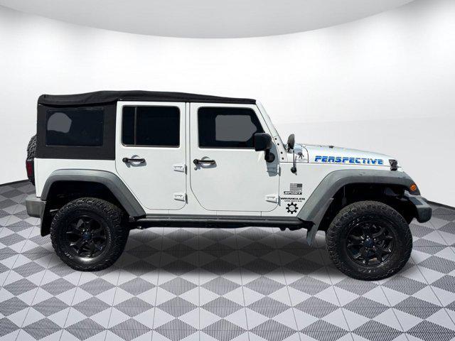 Photo of 2014 Bright White Clearcoat Jeep Wrangler Unlimited