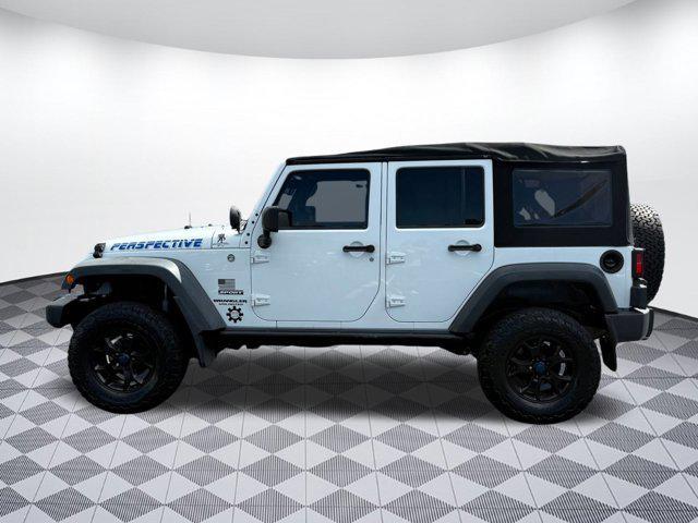 Photo of 2014 Bright White Clearcoat Jeep Wrangler Unlimited