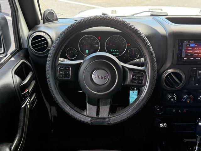 Photo of 2014 Bright White Clearcoat Jeep Wrangler Unlimited