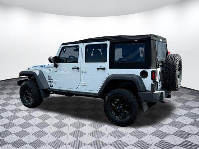 Photo of 2014 Bright White Clearcoat Jeep Wrangler Unlimited