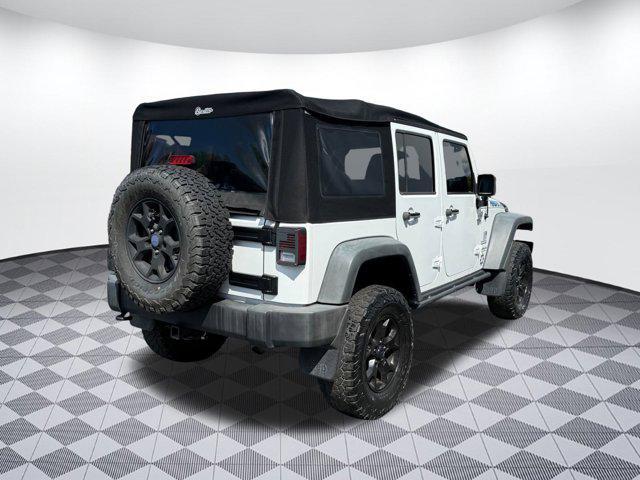 Photo of 2014 Bright White Clearcoat Jeep Wrangler Unlimited