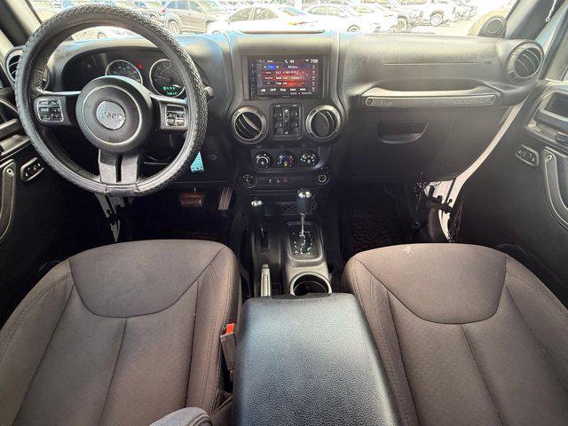 Photo of 2014 Bright White Clearcoat Jeep Wrangler Unlimited