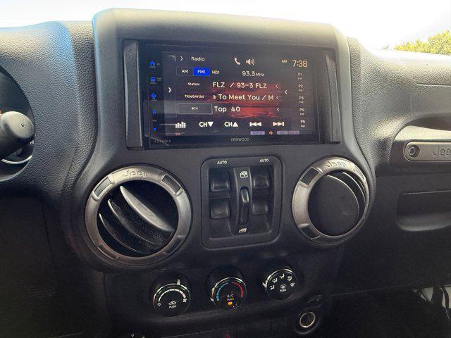 Photo of 2014 Bright White Clearcoat Jeep Wrangler Unlimited