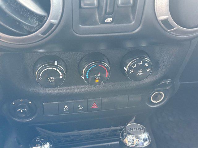 Photo of 2014 Bright White Clearcoat Jeep Wrangler Unlimited