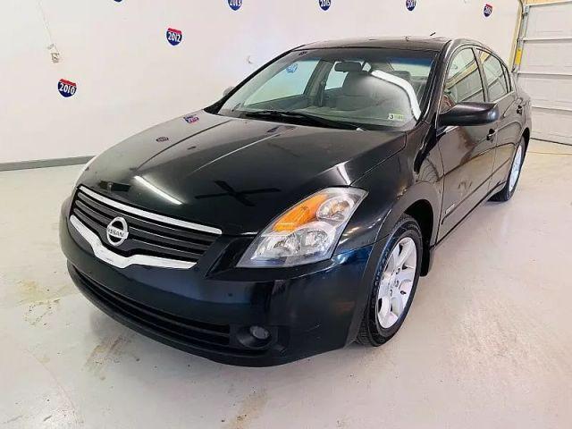 Photo of 2009 Super Black Nissan Altima Hybrid