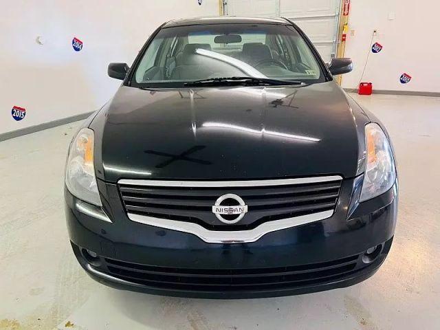 Photo of 2009 Super Black Nissan Altima Hybrid